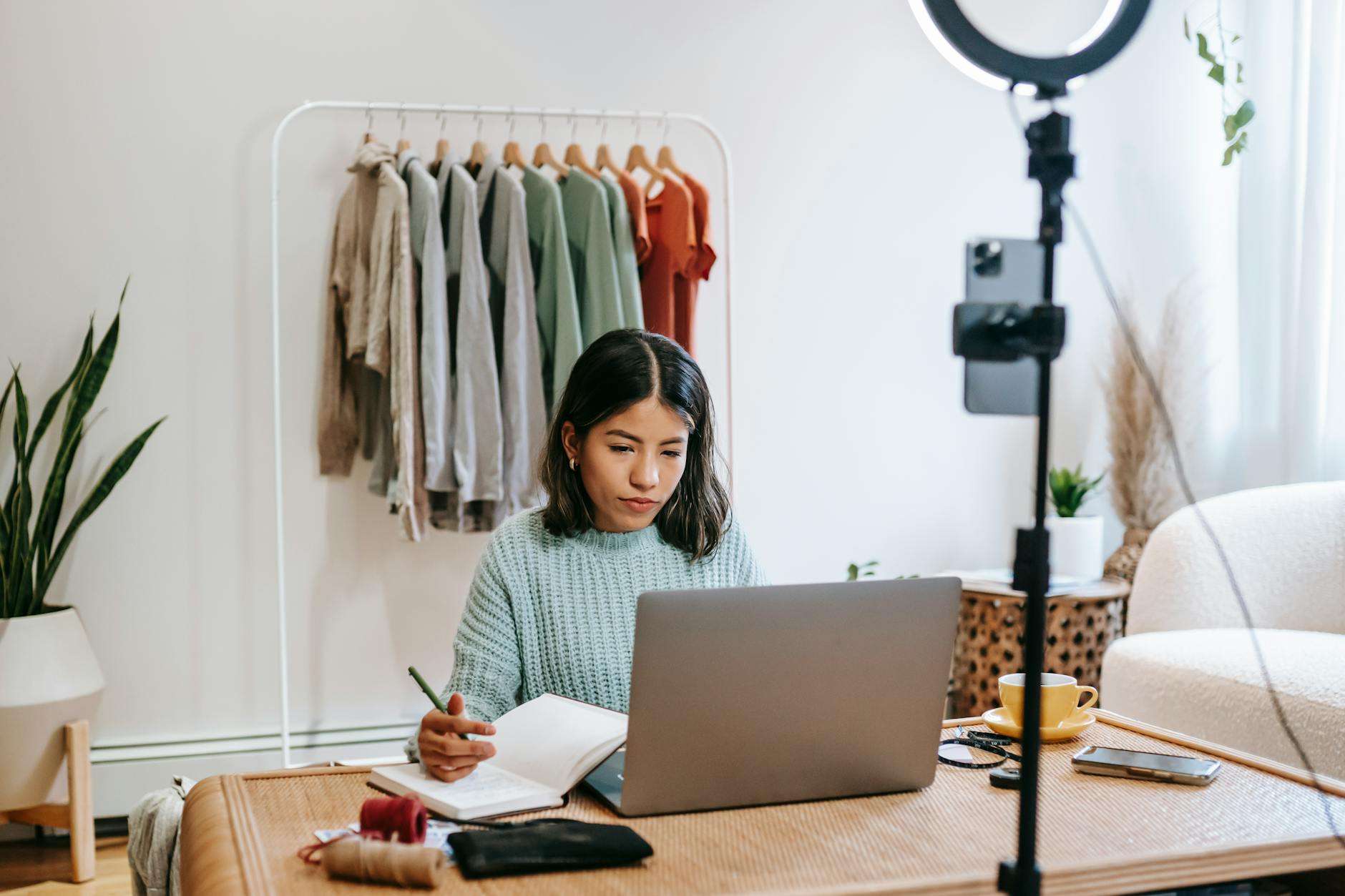 focused blogger working on project at home