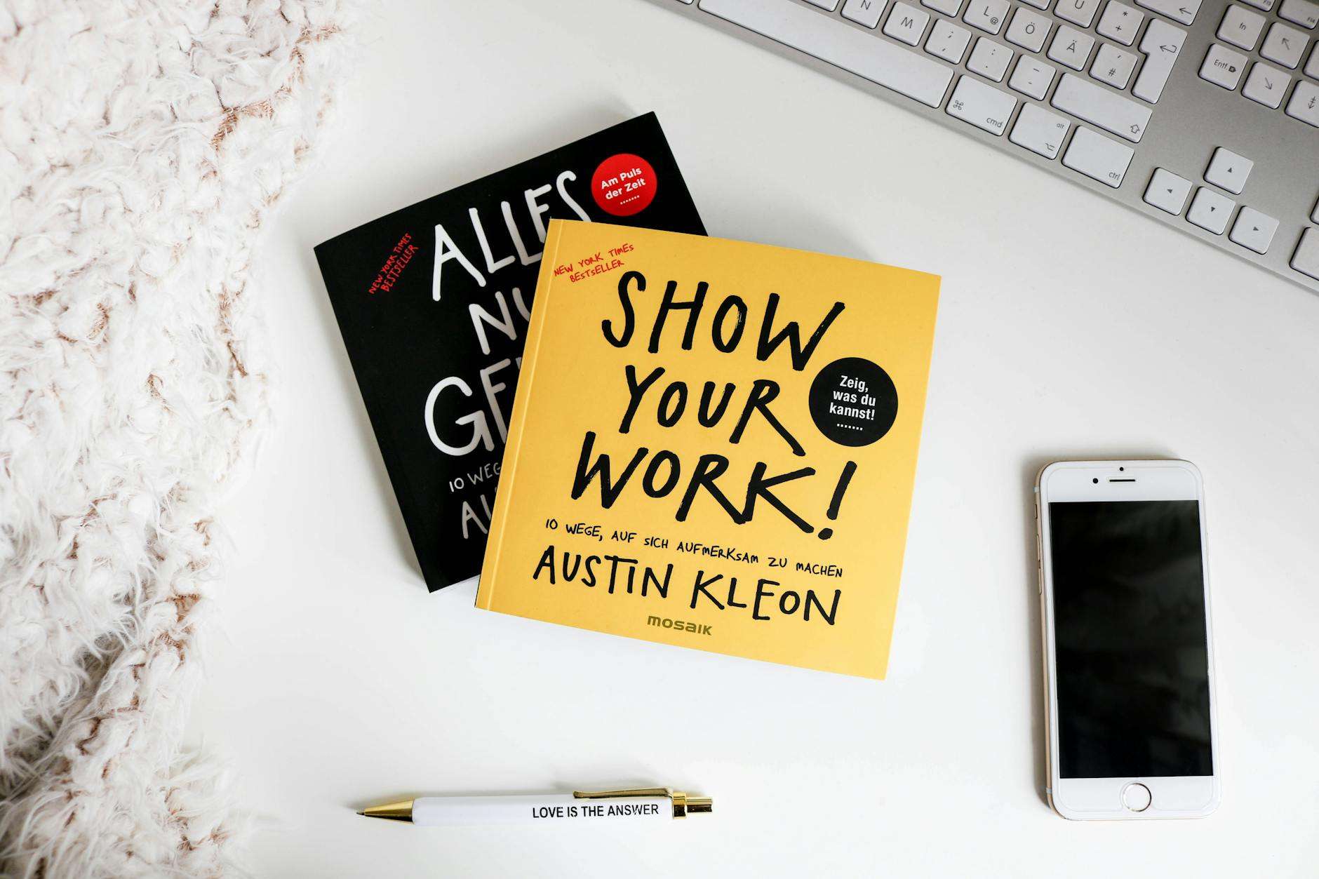 a yellow book with show your work title