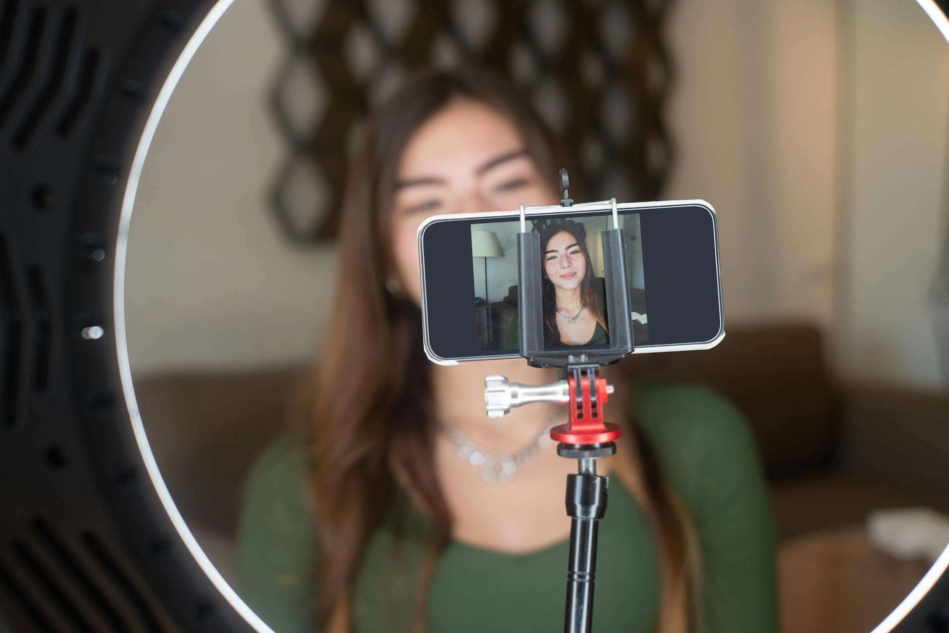 a woman using a smartphone in blogging